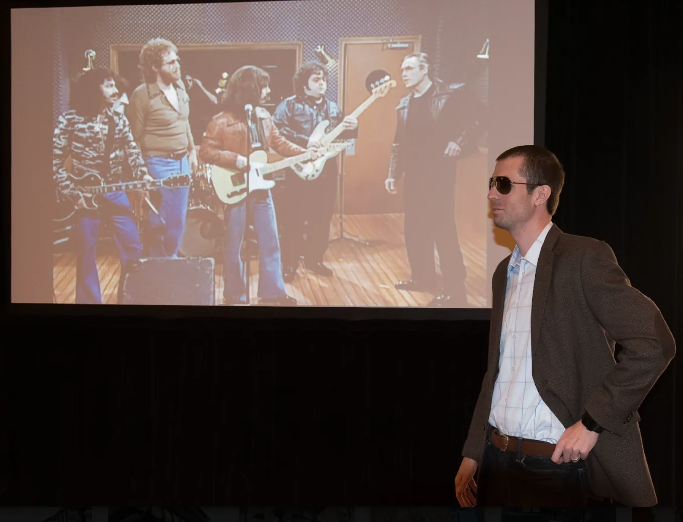 Keith Brown presenting on stage at Aha!